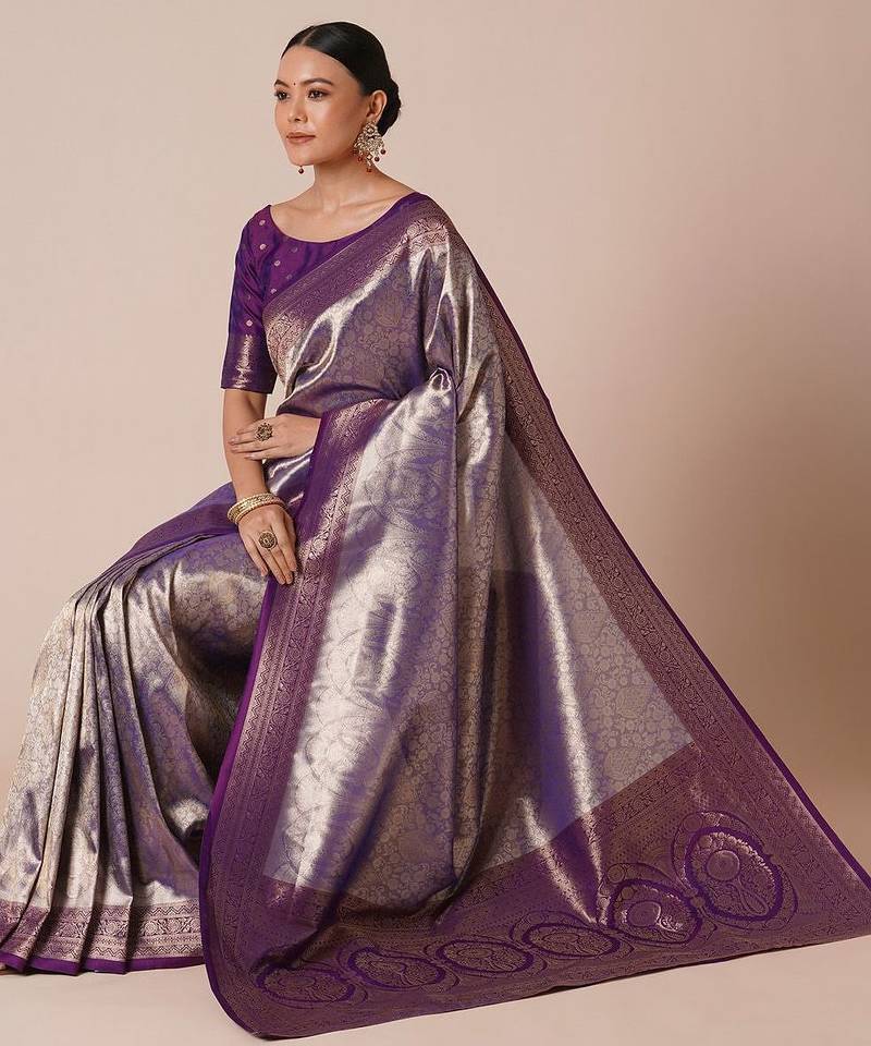 Purple woven design saree with blouse piece