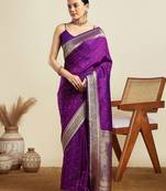 Purple ethnic motifs woven design kanjeevaram saree