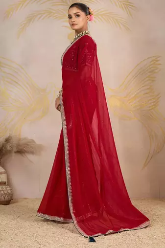 Red sequinned pure georgette saree