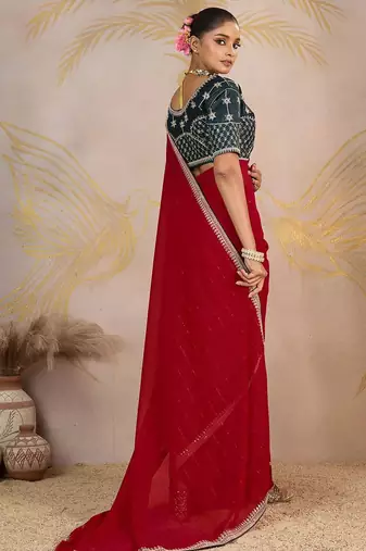 Red sequinned pure georgette saree