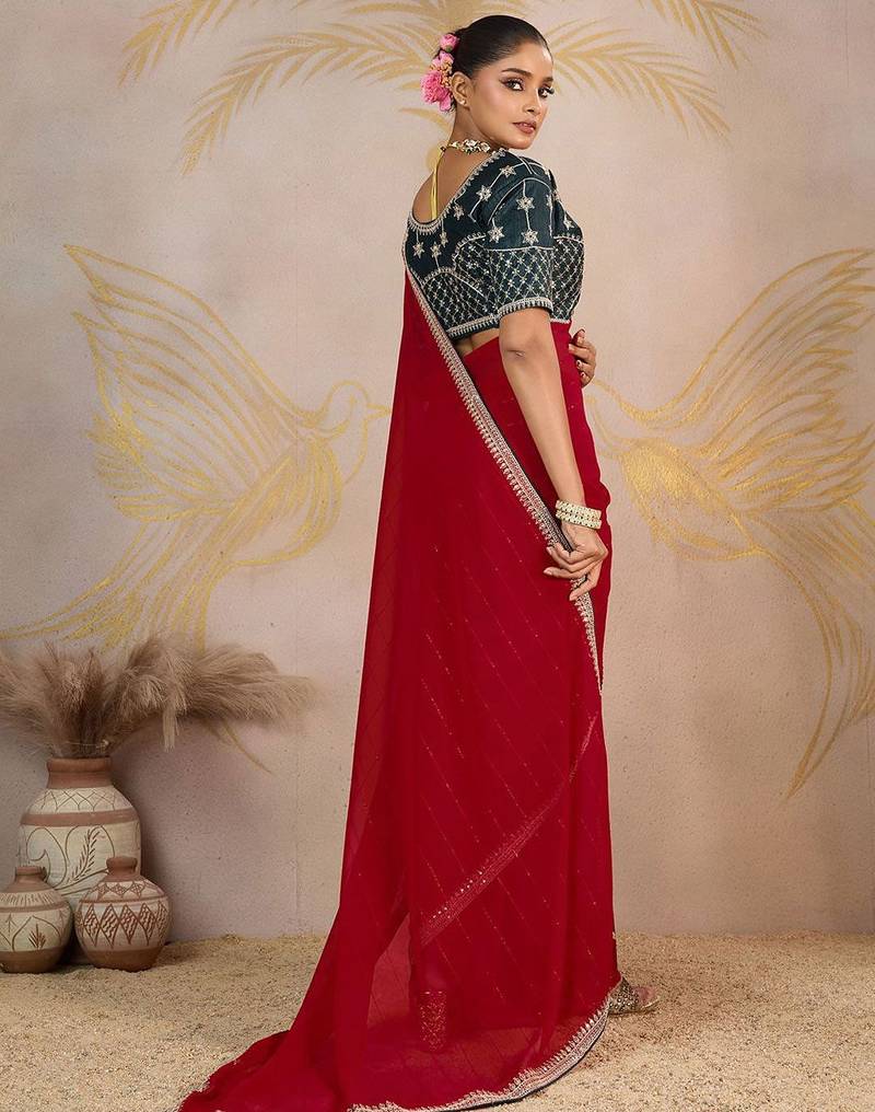 Red sequinned pure georgette saree