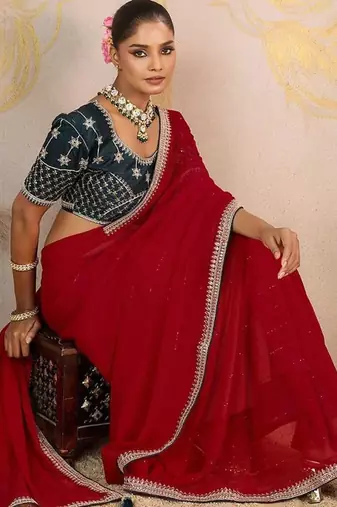 Red sequinned pure georgette saree