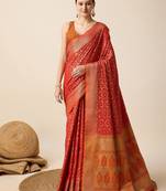 Red art silk woven patola saree with blouse piece