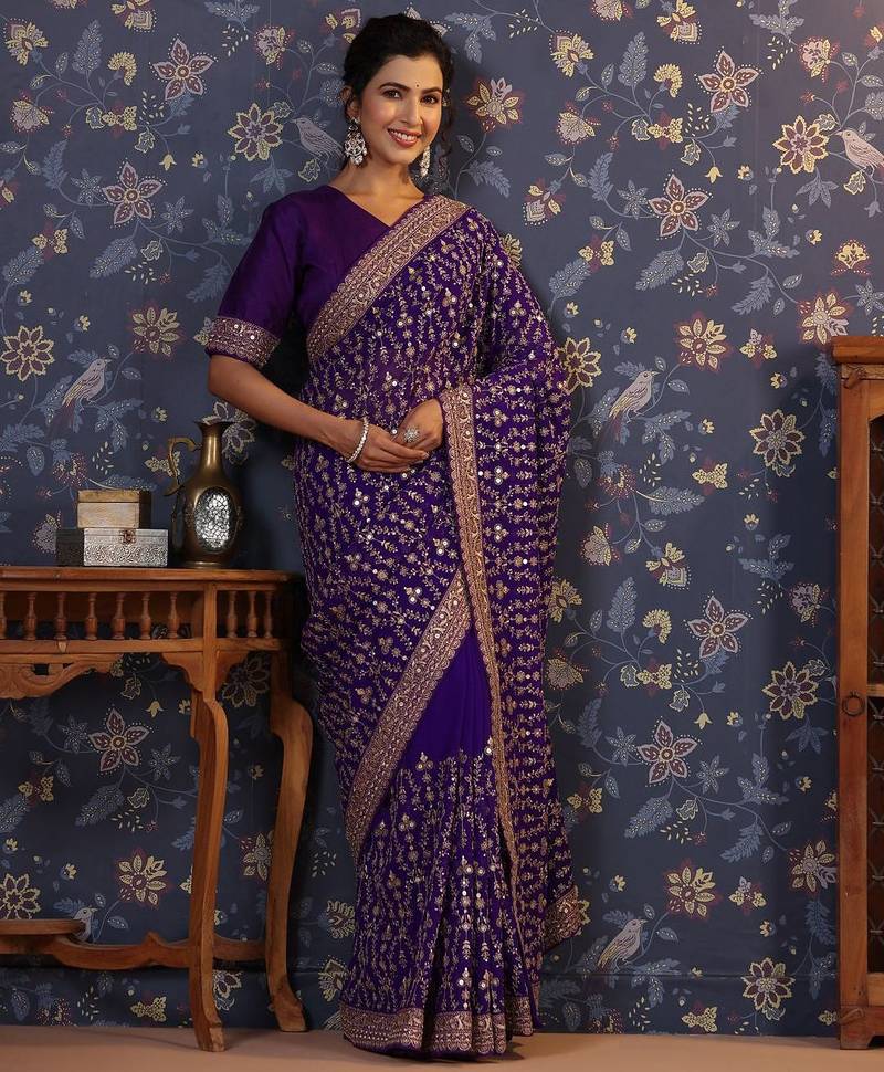 Violet embroidered heavy work saree