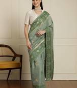 Green ethnic motifs woven design chanderi saree with unstitched blouse