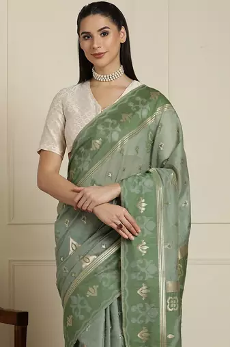 Green ethnic motifs woven design chanderi saree with unstitched blouse