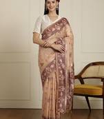 Beige ethnic motif woven design zari chanderi saree
