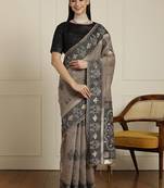 Grey ethnic motif woven design zari chanderi saree with unstitched blouse