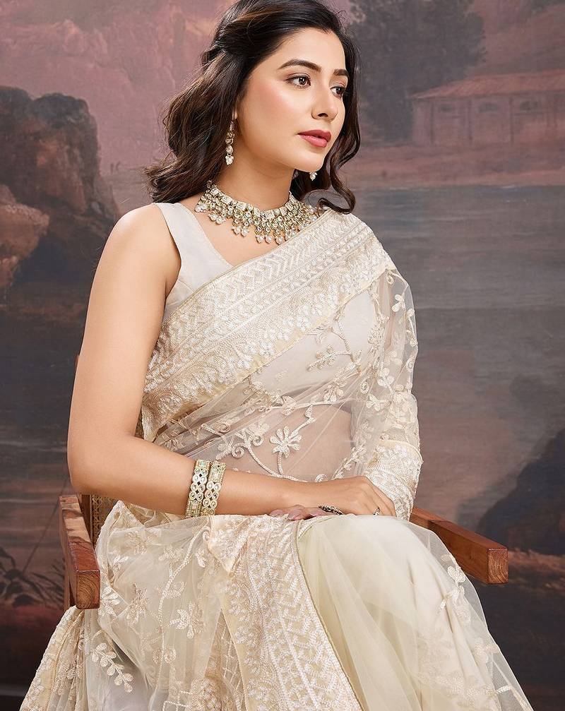Beige floral embroidered saree with blouse piece