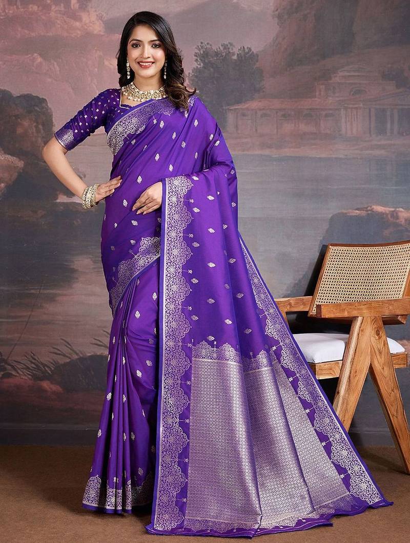 Purple woven design zari saree with blouse piece