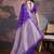 Purple woven design zari saree with blouse piece