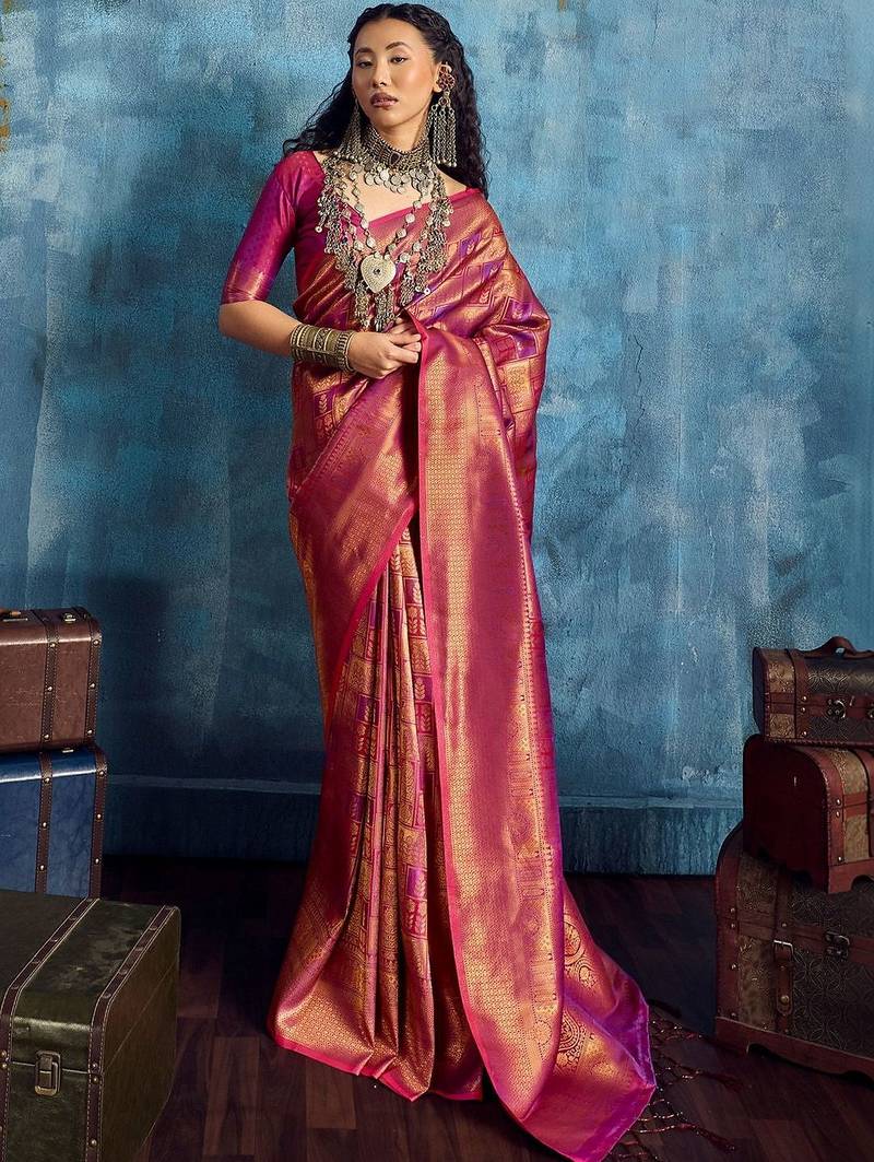 Magenta woven design kanjeevaram saree with blouse piece