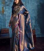 Blue woven design kanjeevaram saree with blouse piece