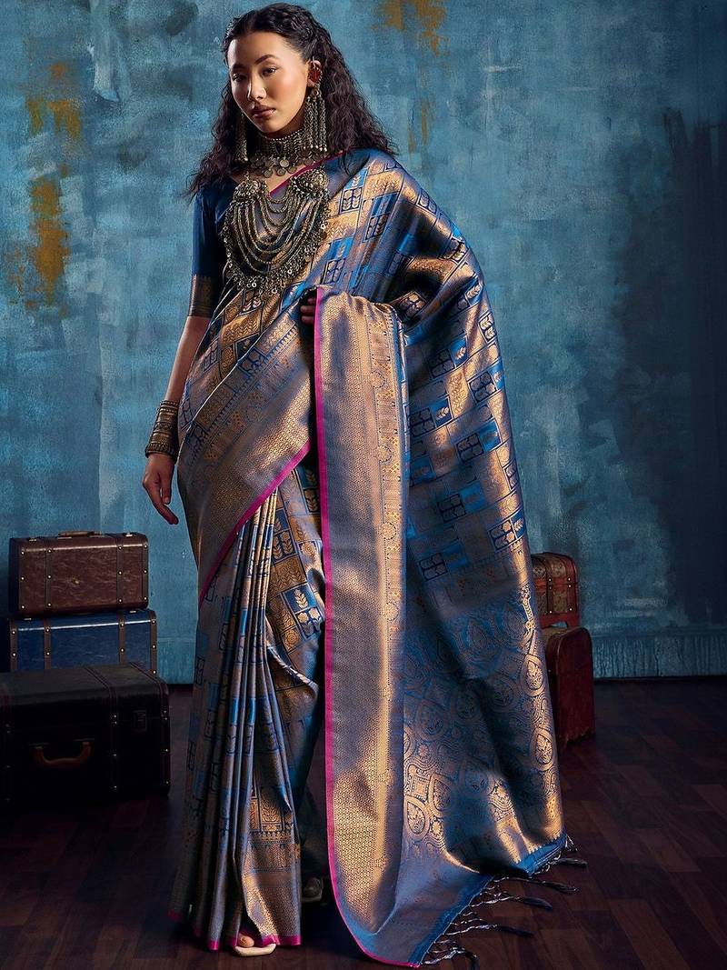 Blue woven design kanjeevaram saree with blouse piece