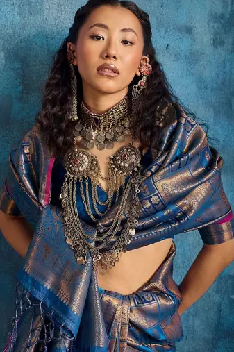Blue woven design kanjeevaram saree with blouse piece