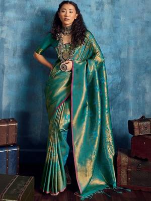Green woven design kanjeevaram saree with blouse piece 1
