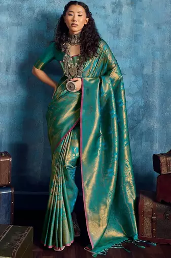 Green woven design kanjeevaram saree with blouse piece