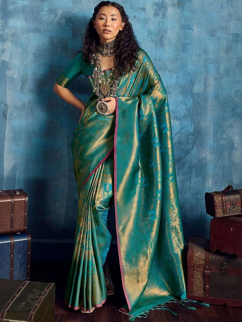 Green woven design kanjeevaram saree with blouse piece