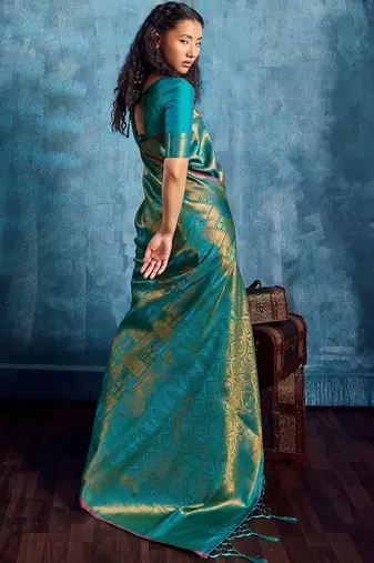 Green woven design kanjeevaram saree with blouse piece
