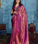 Magenta woven design kanjeevaram saree with blouse piece