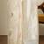 Cream floral motifs printed banarasi saree with blouse piece