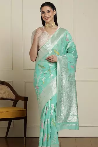 Green floral motif printed banarasi saree with blouse piece