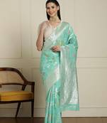 Green floral motif printed banarasi saree with blouse piece