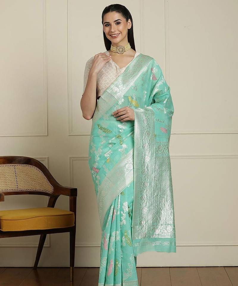Green floral motif printed banarasi saree with blouse piece