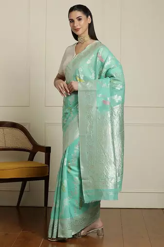 Green floral motif printed banarasi saree with blouse piece