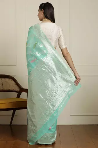 Green floral motif printed banarasi saree with blouse piece