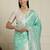 Green floral motif printed banarasi saree with blouse piece