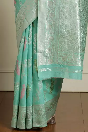 Green floral motif printed banarasi saree with blouse piece