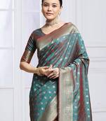 Teal woven design kanjeevaram saree with blouse piece