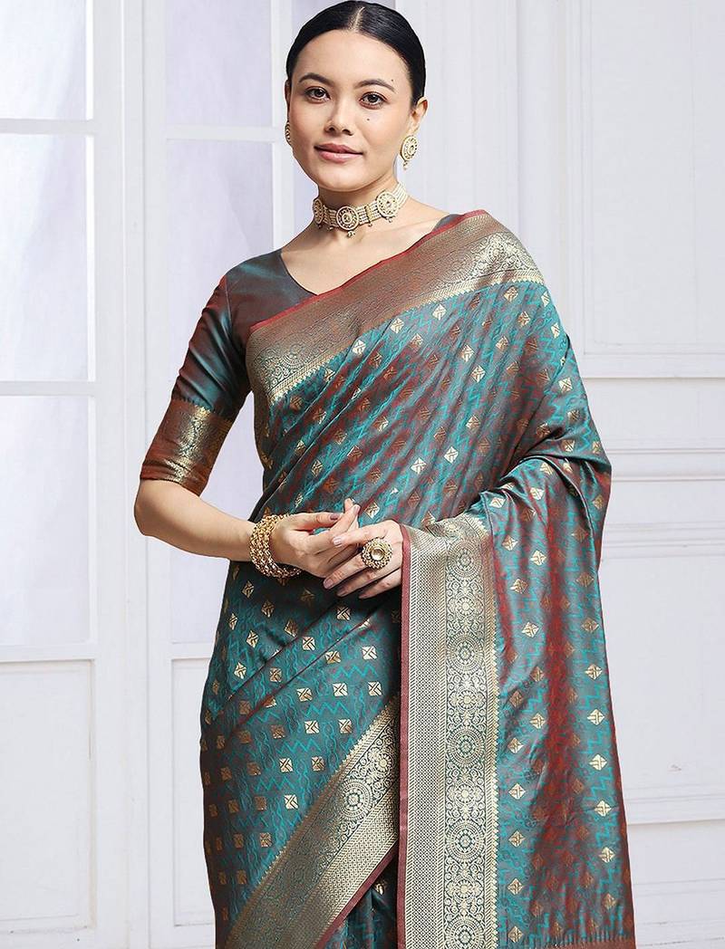 Teal woven design kanjeevaram saree with blouse piece