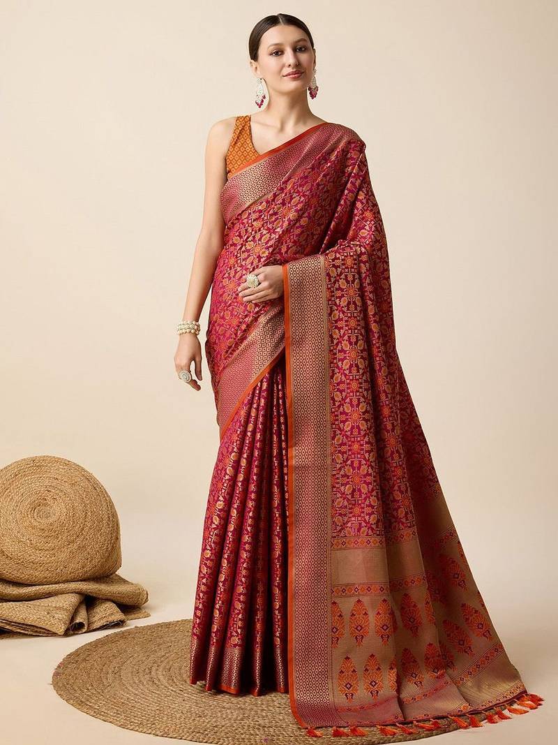 Pink woven design floral patola saree