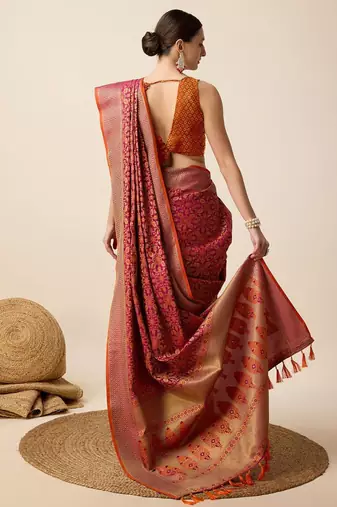Pink woven design floral patola saree