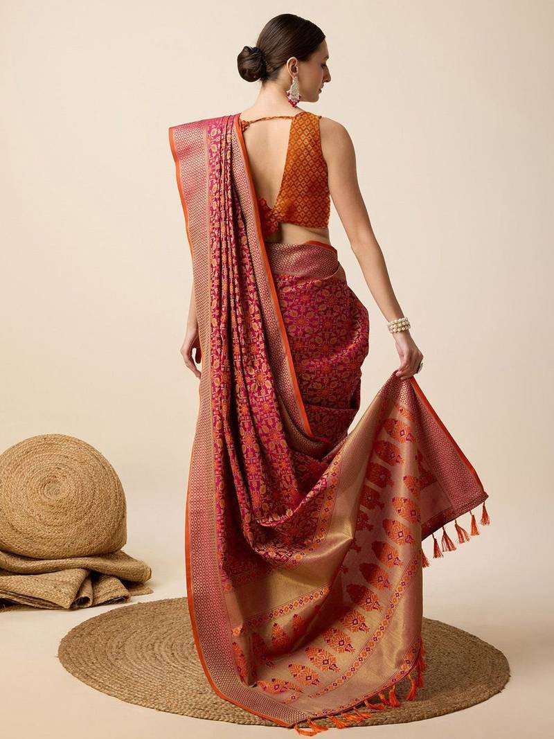 Pink woven design floral patola saree