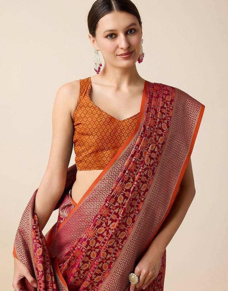 Pink woven design floral patola saree