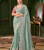 Blue embellished festive wear saree with matching unstitched blouse