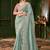 Blue embellished festive wear saree with matching unstitched blouse
