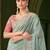 Blue embellished festive wear saree with matching unstitched blouse