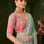 Blue embellished festive wear saree with matching unstitched blouse