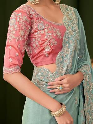 Blue embellished festive wear saree with matching unstitched blouse 4