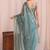 Teal embroidered tissue designer saree