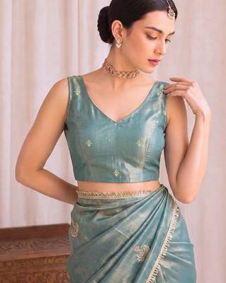 Teal embroidered tissue designer saree 5