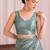 Teal embroidered tissue designer saree