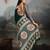 Green ethnic ajrak printed festive wear saree with matching blouse