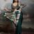 Green ethnic ajrak printed festive wear saree with matching blouse