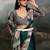 Green ethnic ajrak printed festive wear saree with matching blouse