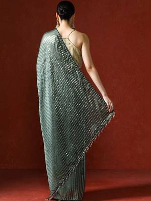 Green embellished sequinned saree with blouse 4